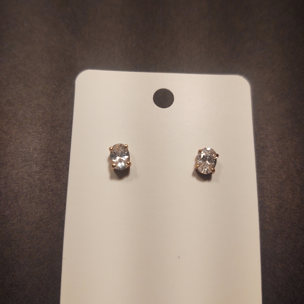 Gold oval diamond stud earrings